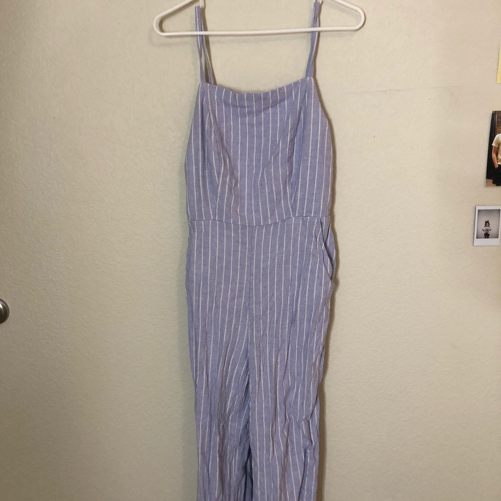 a blue and white jumpsuit